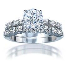 Diamond solitaire with matching band